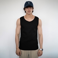 Model wearing ITIZ Flair stretch tank top in black– relaxed summer outfit