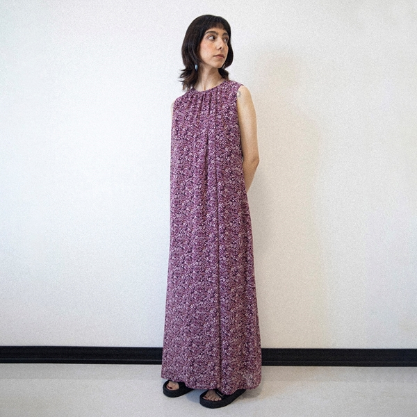 Model wearing ITIZ Cherry Blossom chiffon dress in wine red tone