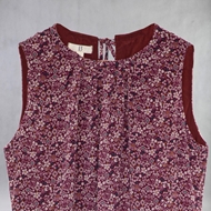 Front detail of ITIZ Cherry Blossom chiffon dress with wine red floral pattern