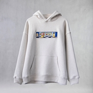 Front view of ITIZ Virgo oversize cream hoodie with chest embroidery