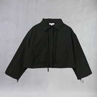 Front view of charcoal ITIZ Tarantula coat from ITIZ × DollVovCinte collaboration