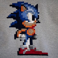 جزئیات گلدوزی بزرگ پشت هودی Sonic ITIZ با طراحی برجسته و فرم اورسایز